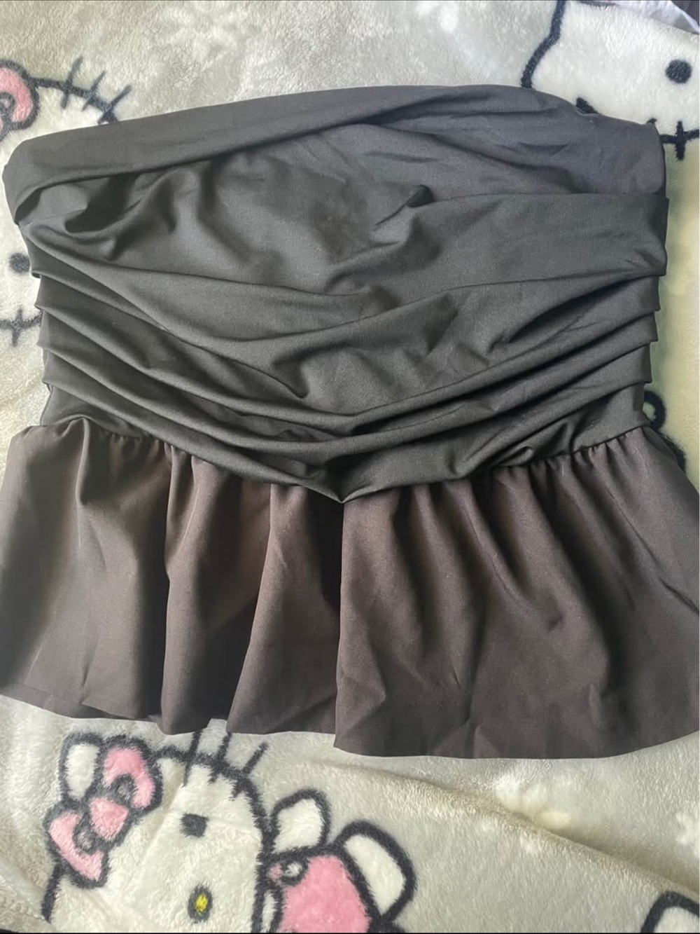 Black Strapless Ruffled Peplum Top